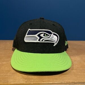 New Era
Seattle Seahawks 9Fifty On Field Navy/Green Snapback